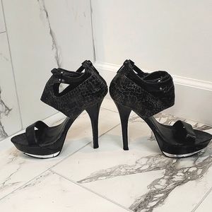 Michael Antonio 5 inch heels black with snake detail, back zipper, buckle etc.